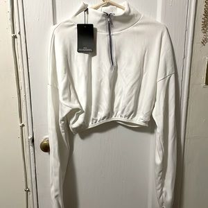 Pretty little thing crop half zip sweater in white